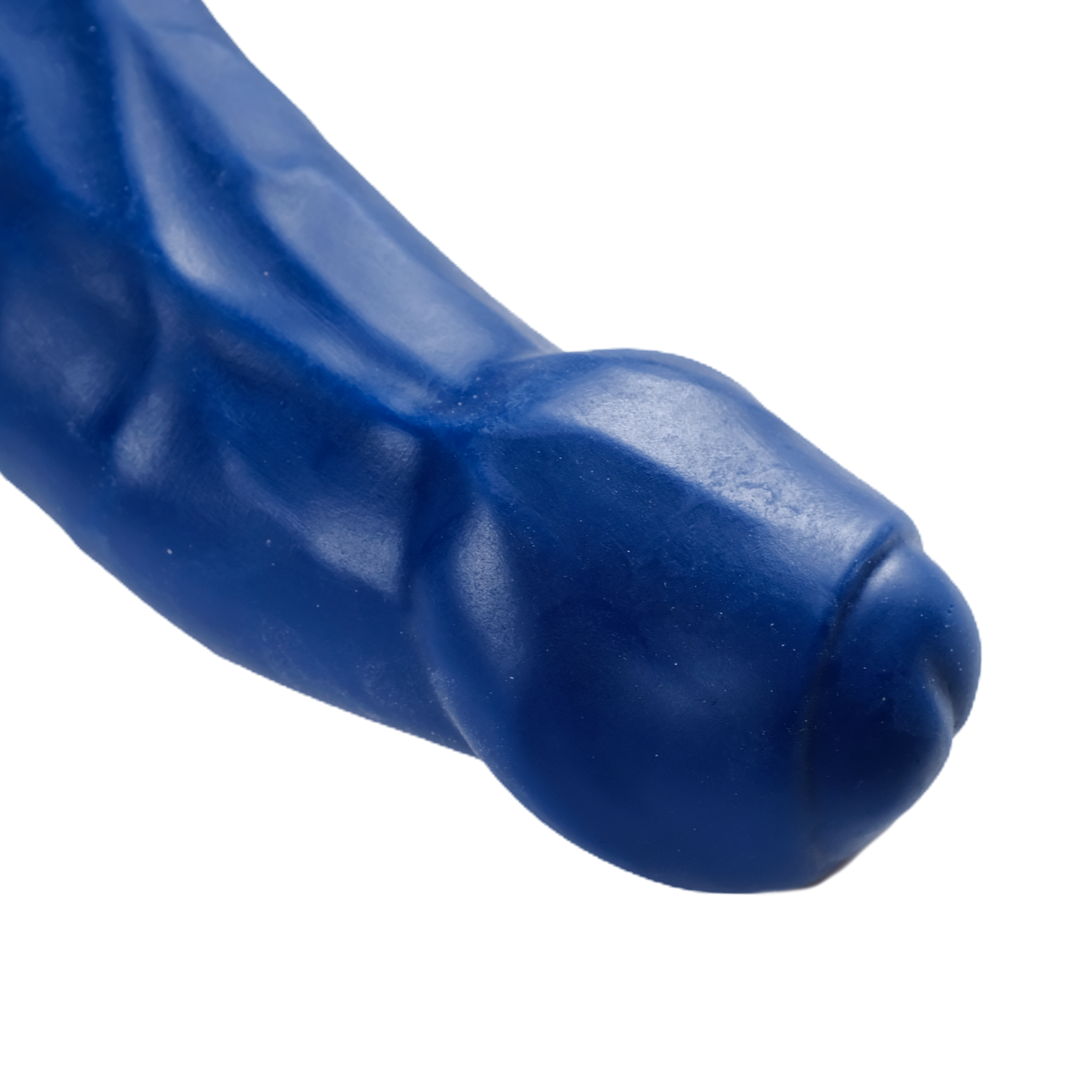 Close-up of the head, on Blue. Foreskin is partially retracted, revealing the tip.