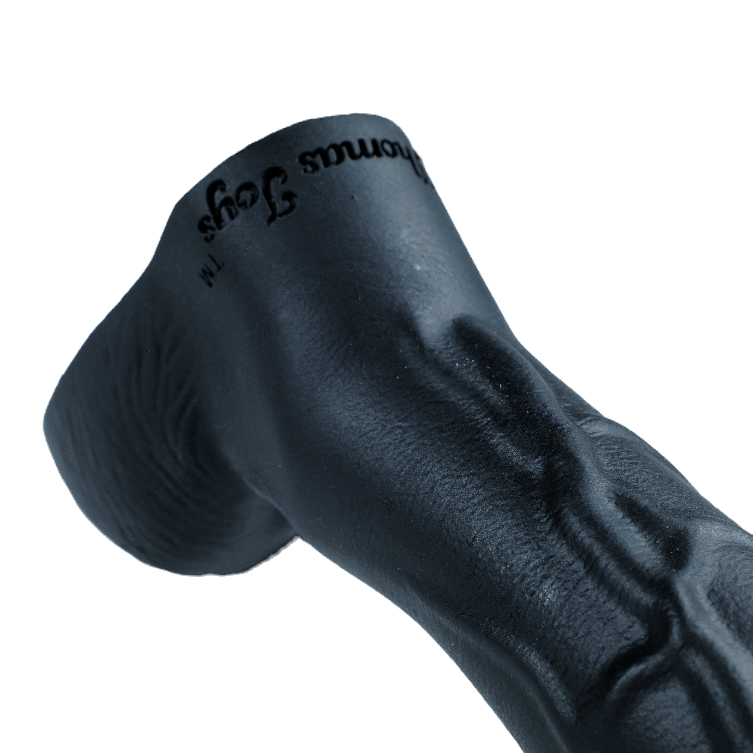 Close-up of the John Thomas Toys logo at the base of the shaft.